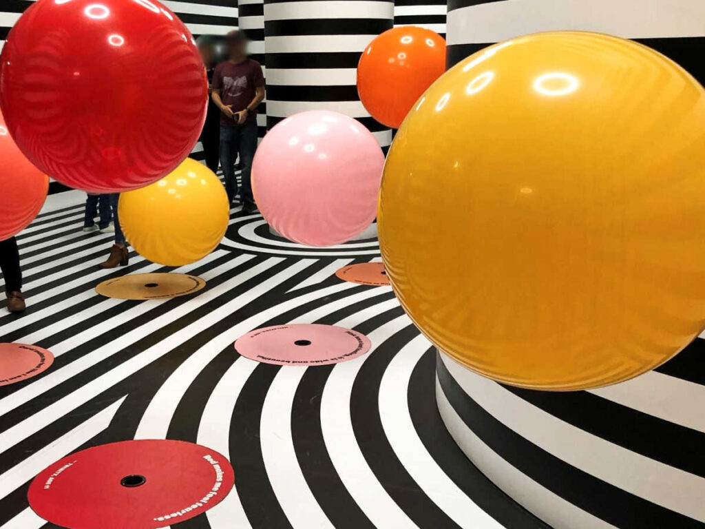 View of the colorful art installation at the Floating Ball Room in the Color Factory