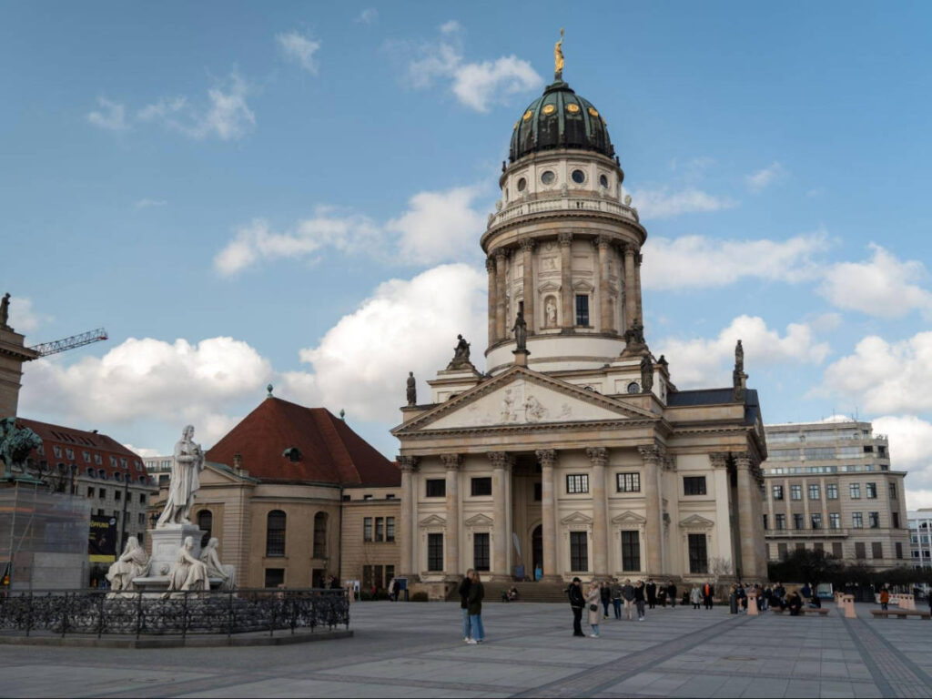 View of the sculpture and the square in Französischer Dom