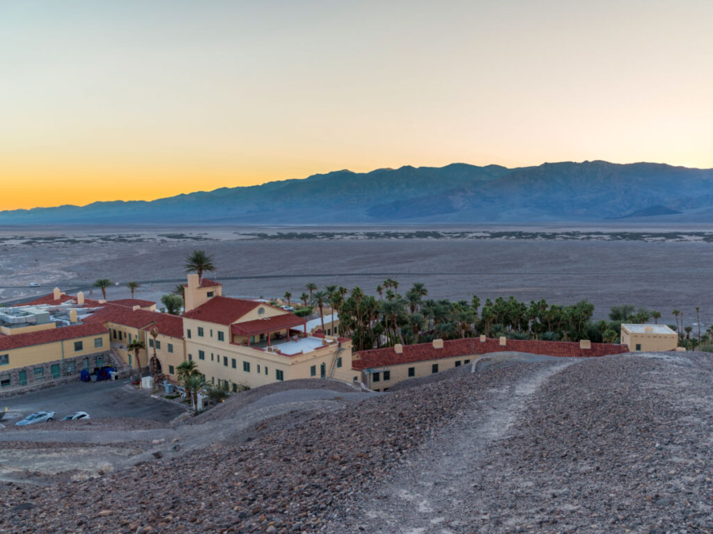 Sunset dusk at Furnace Creek Resort in Death Valley National Park with mountains in the background