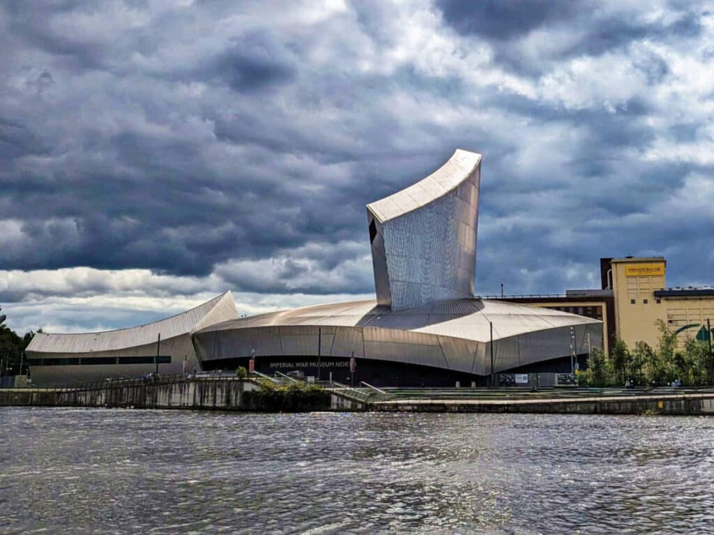 View of the unique and iconic design of The Imperial War Museum North from across the water