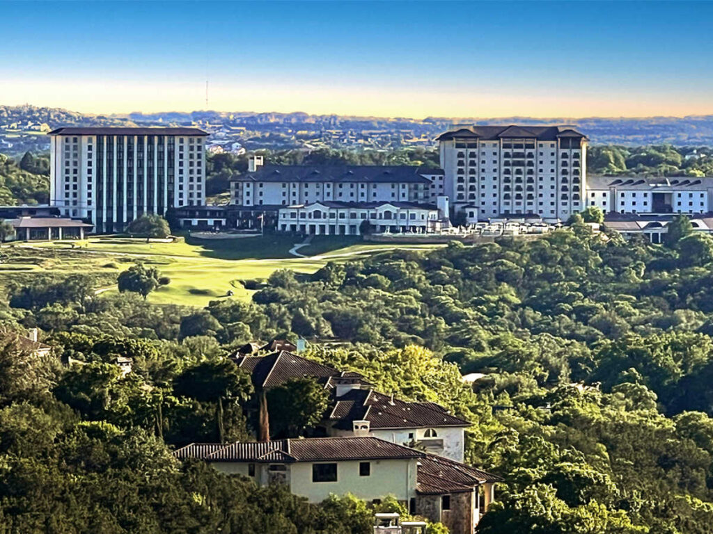 Overlooking view of the Omni Barton Creek Resort and Spa surrounded by greenery