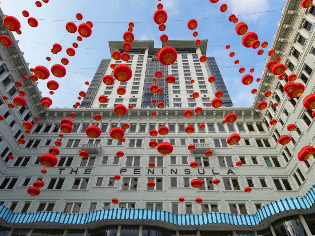 View of the lanterns hanging in front of The Peninsula Hotel