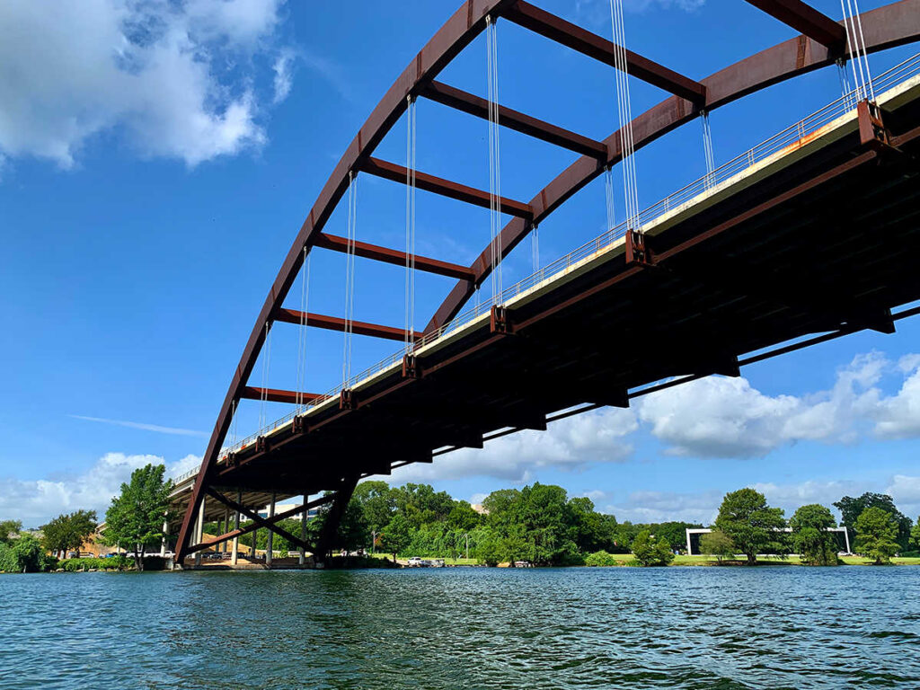 Perspective view of the Pennypacker Bridge and the clear blue sky above