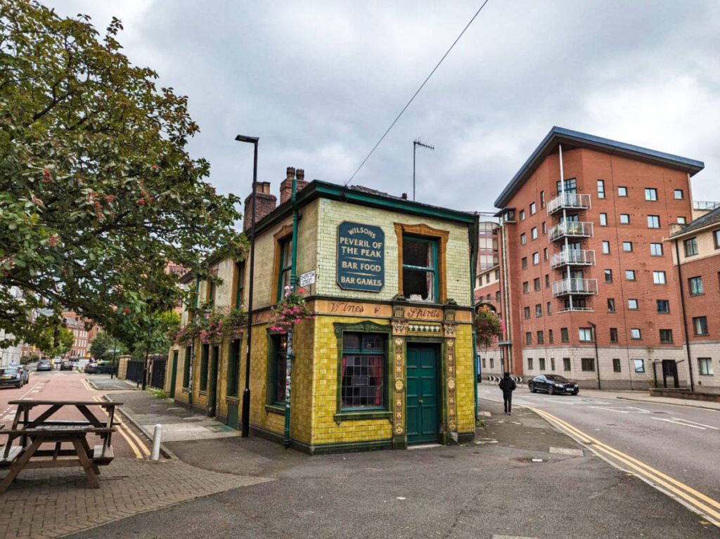 View of the vibrant exterior of The Peveril of the Peak at Oxford Road Corridor