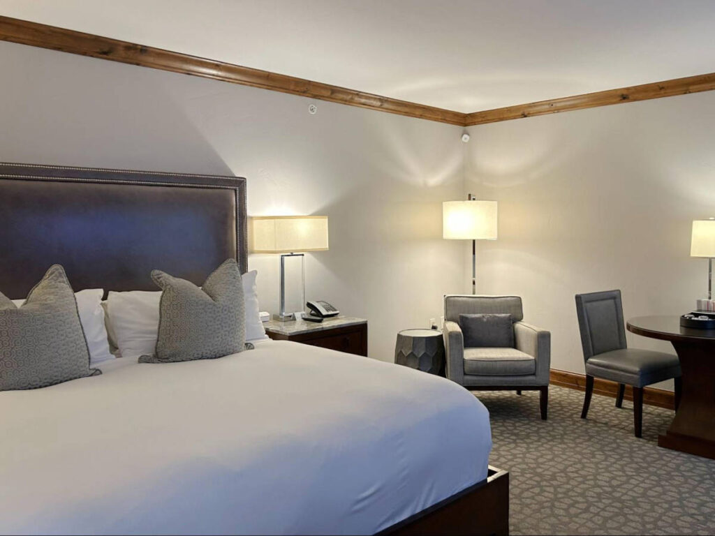 View of the bed and the spacious hotel room of in The Sebastian