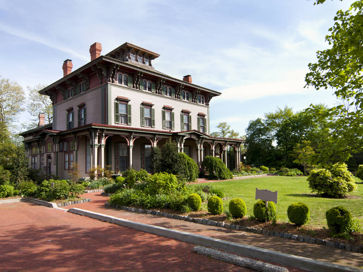 Outside view of the The Southern Mansion in Cape May, built with Victorian architecture, with garden yard