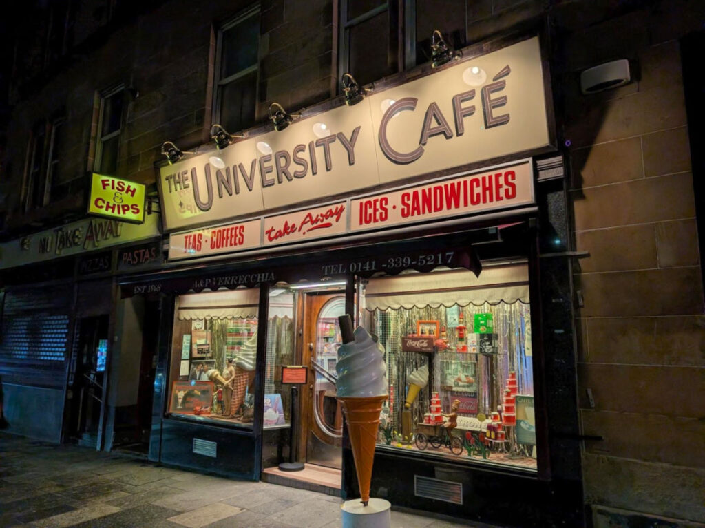 Facade of University Cafe at night