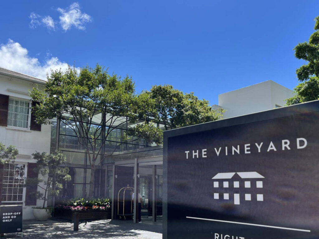 View of the signage outside the Vineyard Hotel Sign