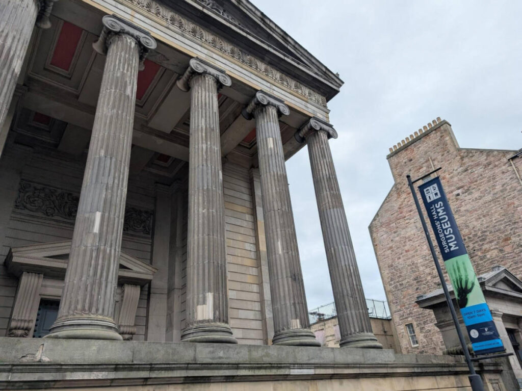 Perspective view of the intricate pillars and facade of The William Playfair