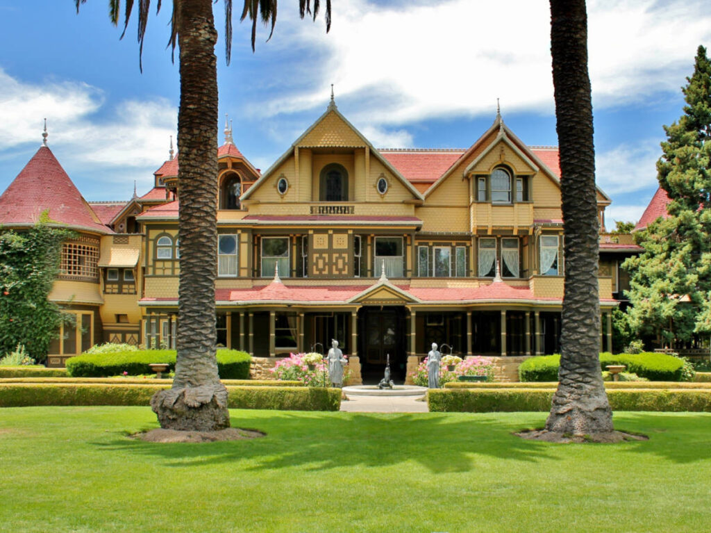 Front yard view of the Winchester Mystery House on a sunny day