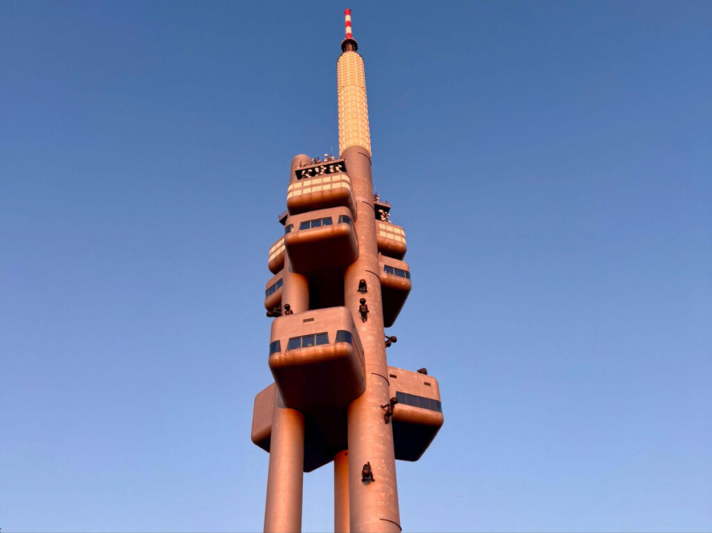 The Žižkov Television Tower against the clear blue sky