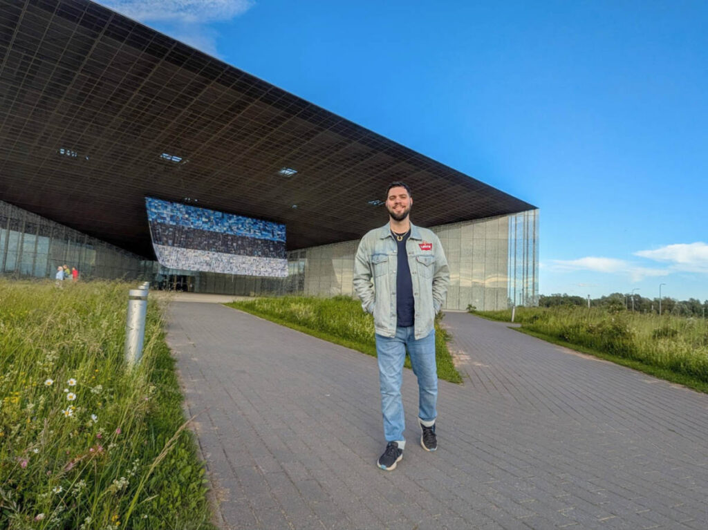 The author Thom Brown outside the grand entrance to the Estonian National Museum
