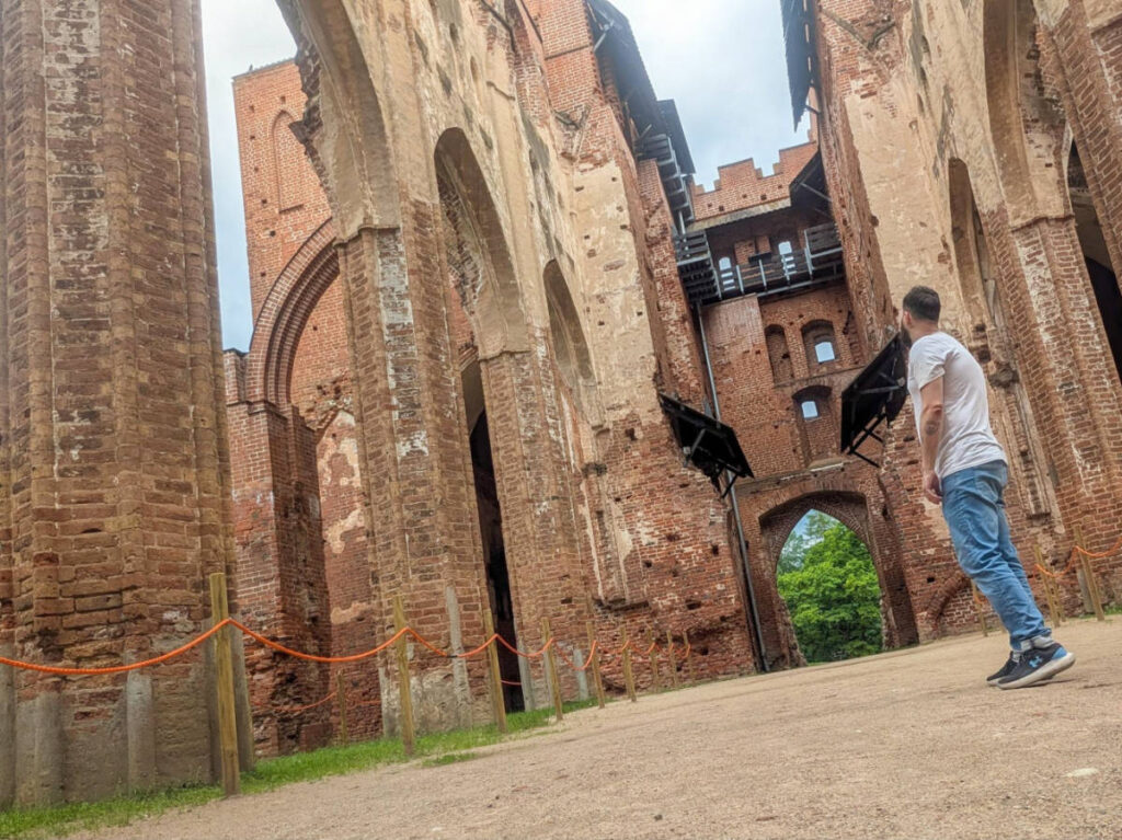 The author Thom Brown, exploring the Tartu Cathedral ruins