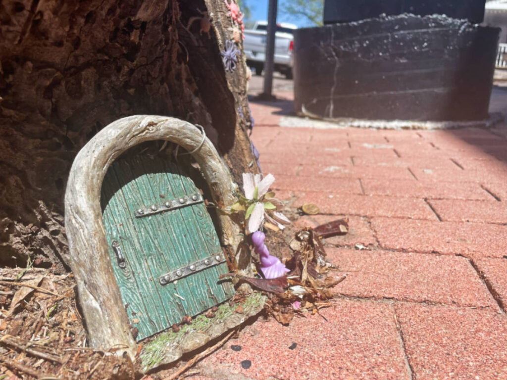 View of a tiny door made for fairies or trolls 