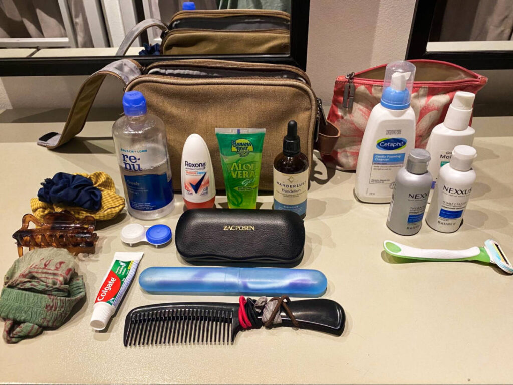 Closeup look of the toiletries laid out outside the bag