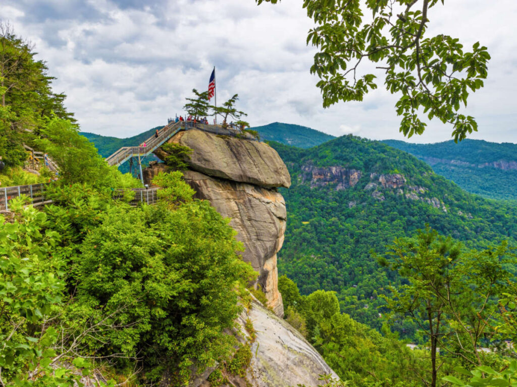View of the summit of the Chimney Rock State Park surrounded by greenery