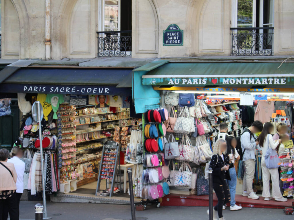View of people and shops on a street