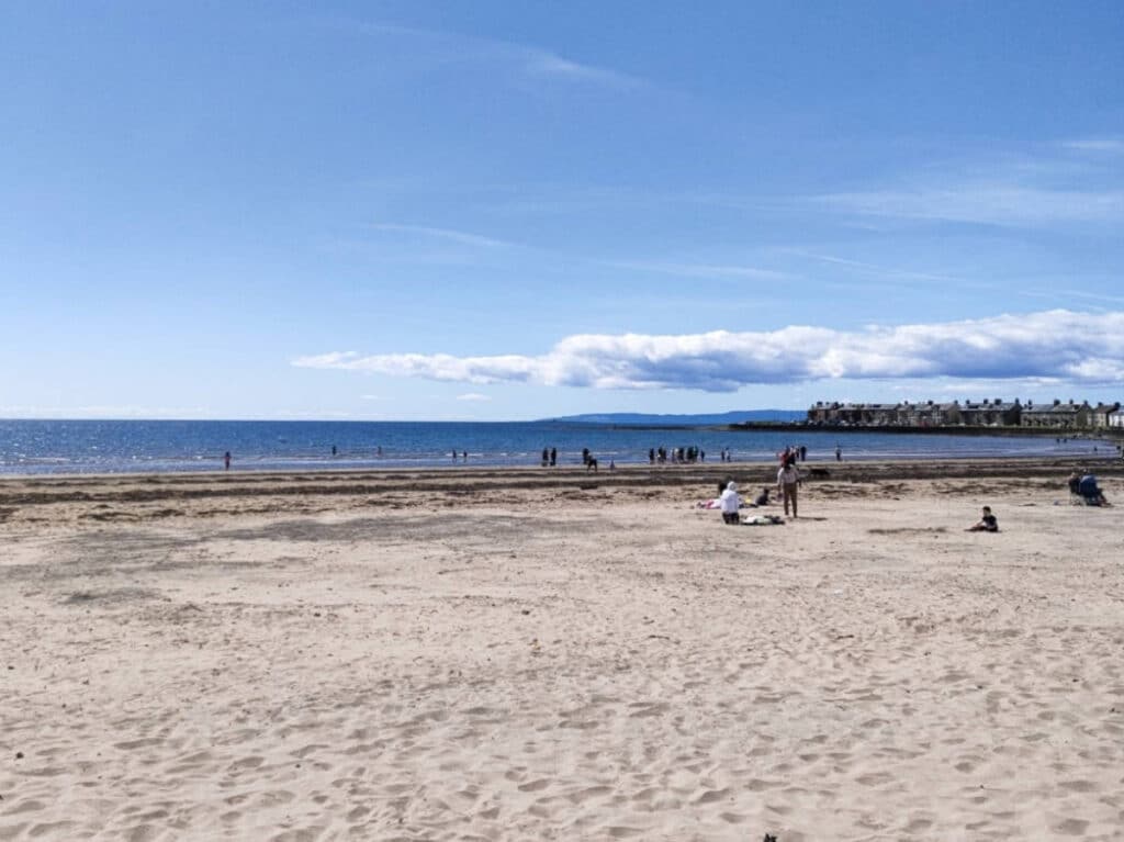 People enjoying their summer at Troon Beach