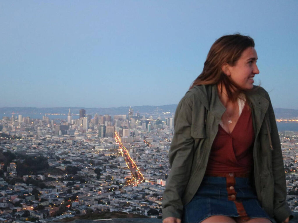 The author, Laura McFarland sitting on the Twin Peaks lookout