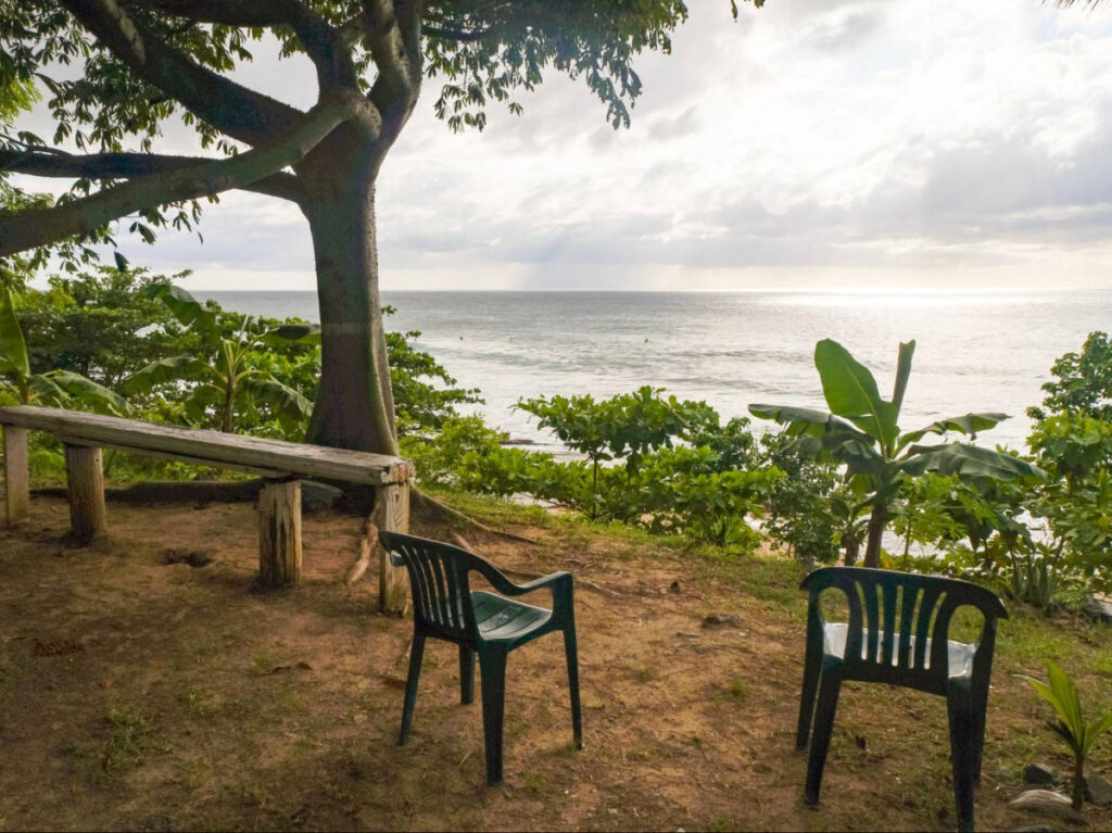 Two plastic chairs with an overlooking view in Rincón