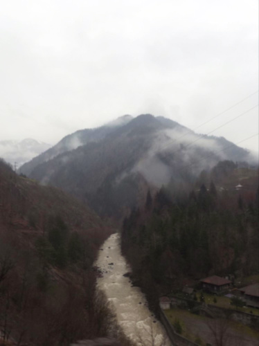View of the fog over the hills and river in Upper Adjara