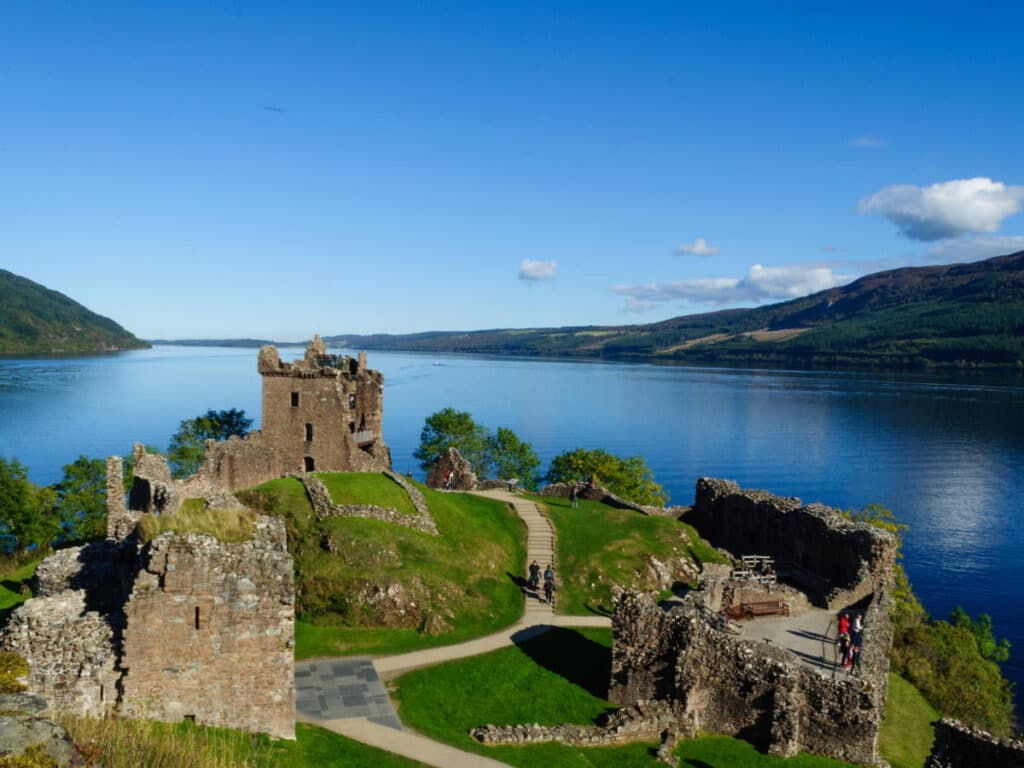 Clear blue sky over the Urquhart Castle and Loch Ness.