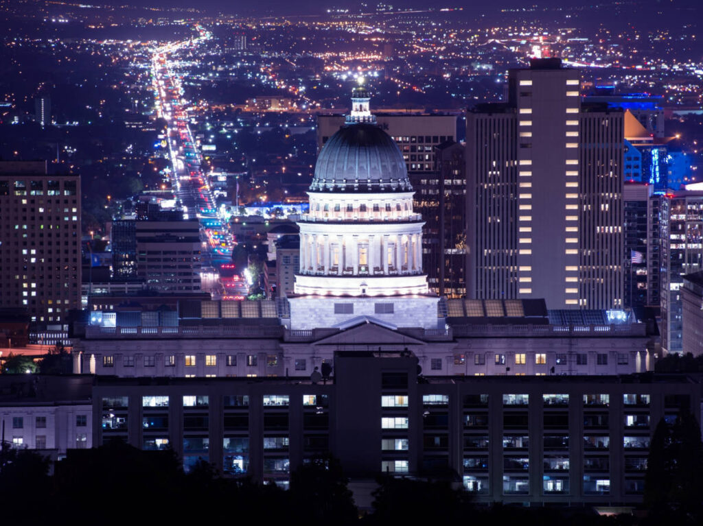 Aerial view of the Utah Capitol Building illuminated at night