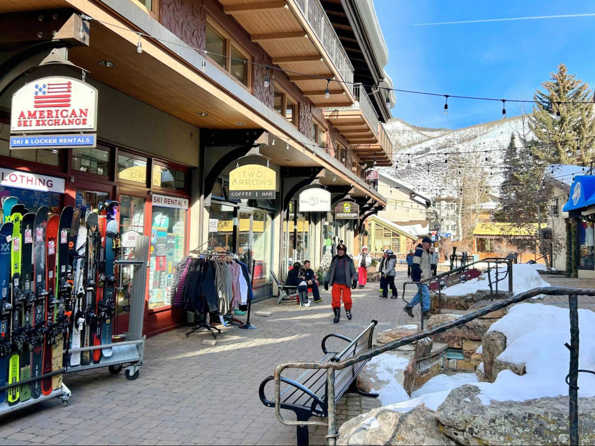 View of the restaurants, shops, and the slopes in Vail Village