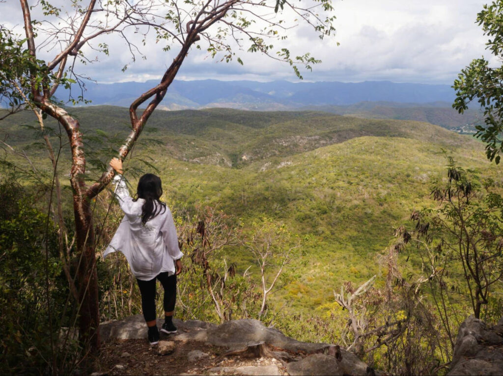 The author Vanessa Ramos, enjoying the overlooking view from the trail to Guánica State Forest
