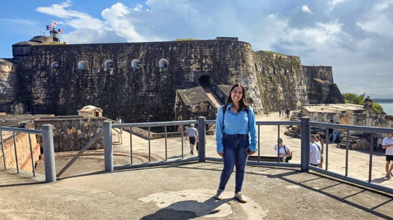The author, Vanessa Ramos standing for a photo in Castillo San Felipe del Morro