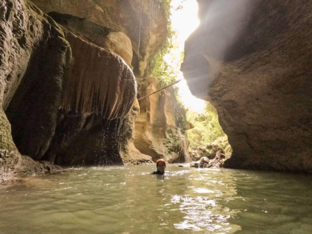 The author Vanessa Ramos, swimming inside the Cueva Arenales