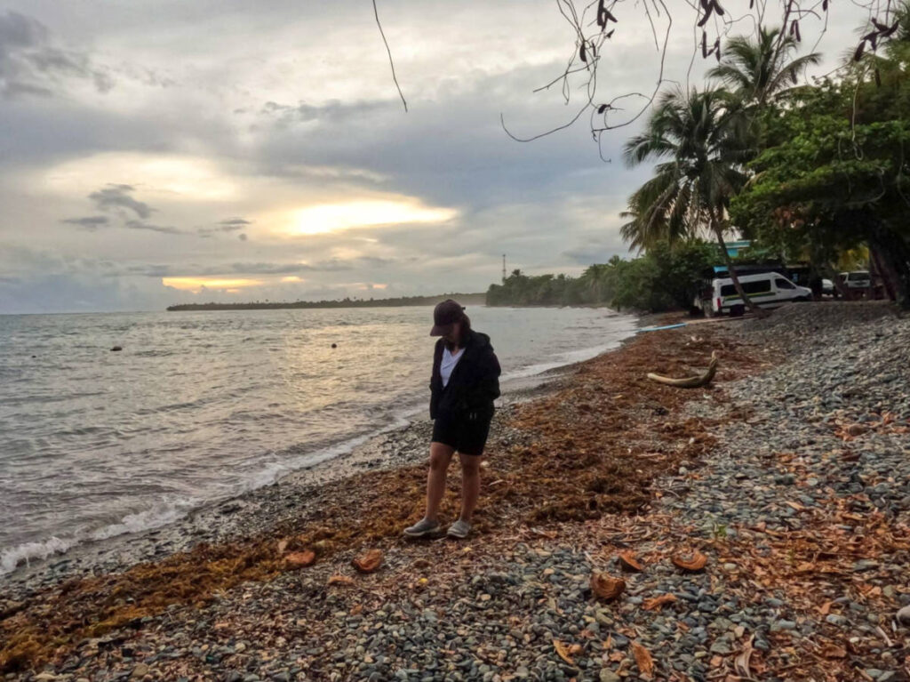 The author Vanessa Ramos, walking along the Inches Beach