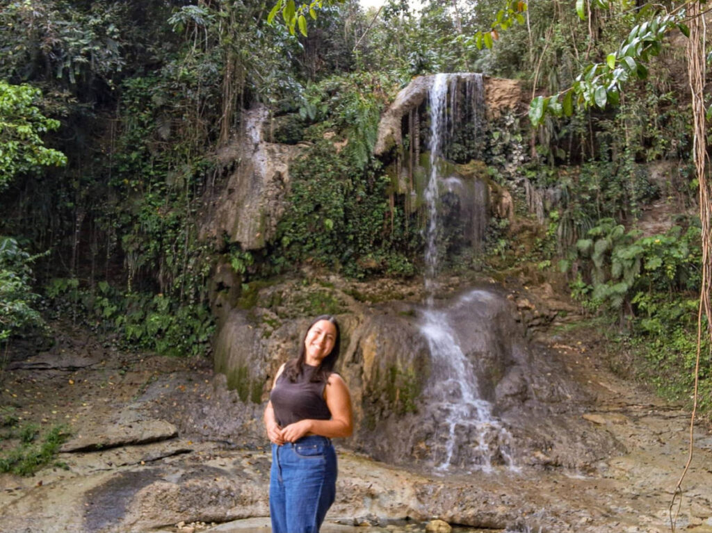 Travel Lemming writer Vanessa Ramos, posing for a photo in front of the Salto Collazo