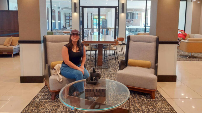 Travel Lemming writer Vanessa Ramos, sitting at the lobby in the Courtyard Hotel in Aguadilla