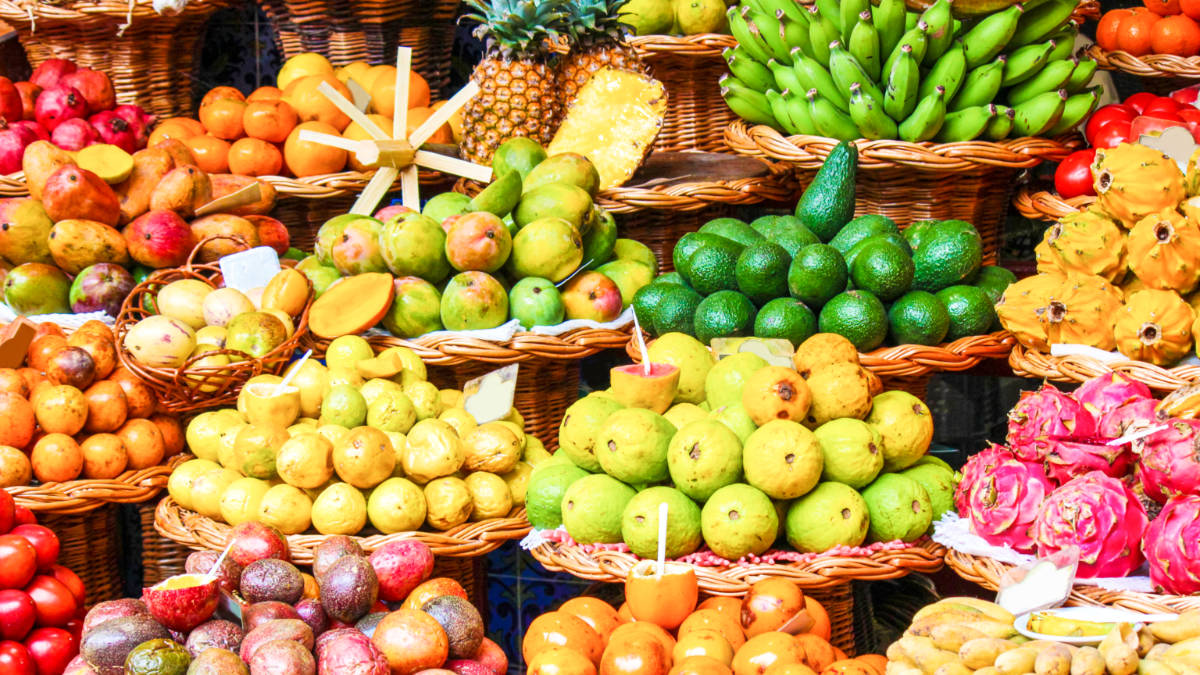 View of the vibrant and wide variety of tropical fruits displayed in the market