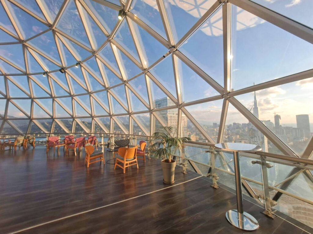 The seating area with an overlooking view from the Alphabet Tower