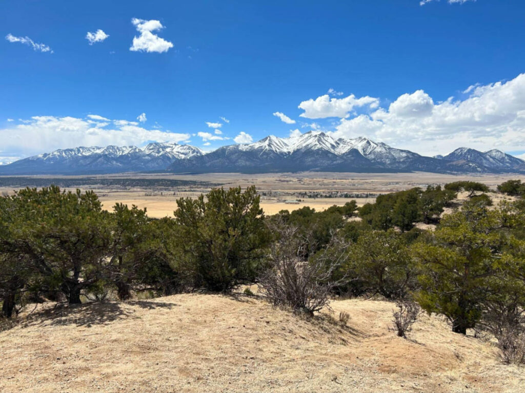 Panoramic view of the snow capped mountains and the greenery from BV Overlook Camp & Lodging