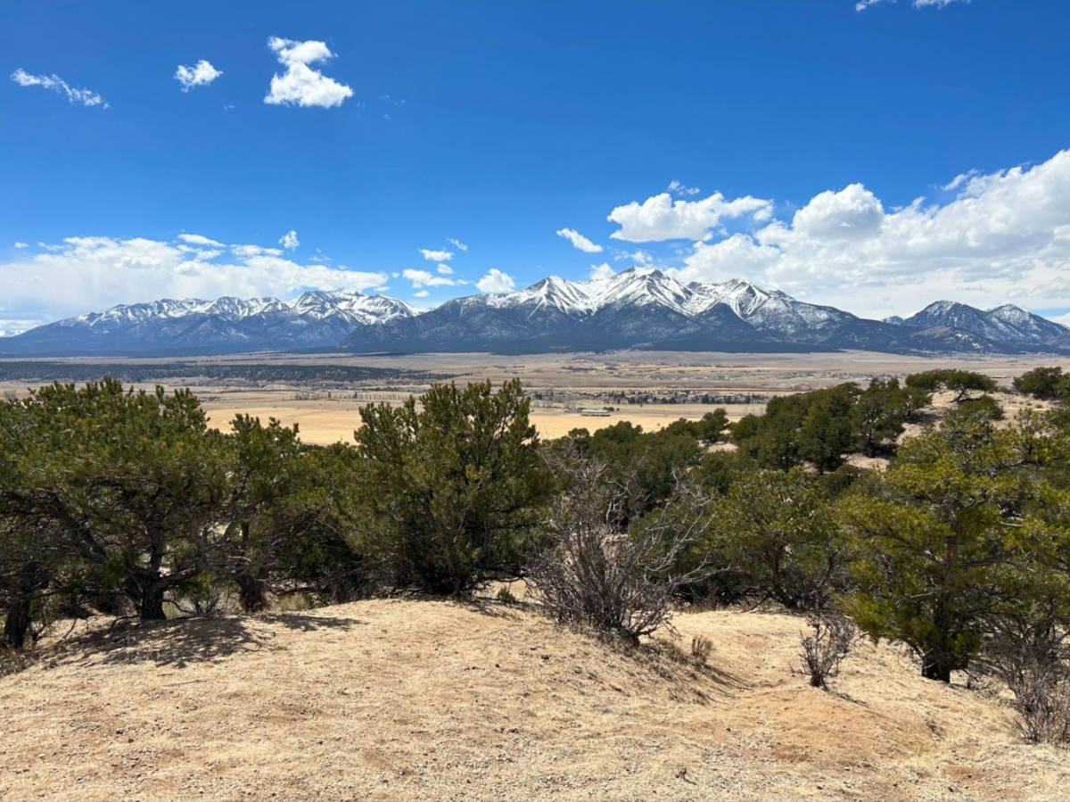 Panoramic view of the snow capped mountains and the greenery from BV Overlook Camp & Lodging