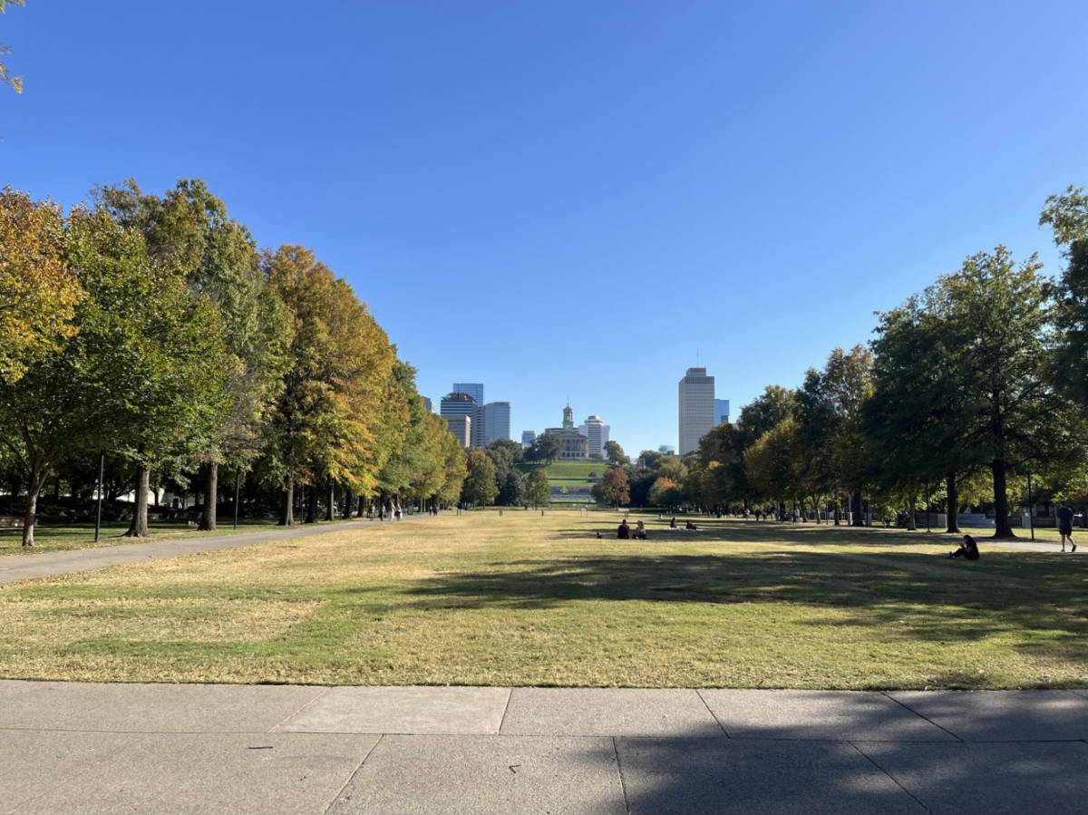 View of the Tennessee Capitol building from the Bicentennial Capitol Mall State Park surrounded by lush greenery