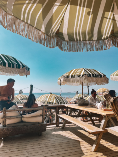 People lounging at the beach in Club Zand
