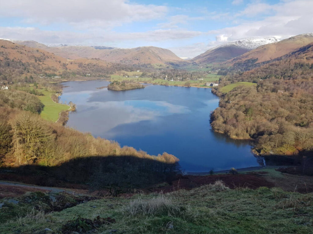 Overlooking view of the lake and the village of Grasmere around