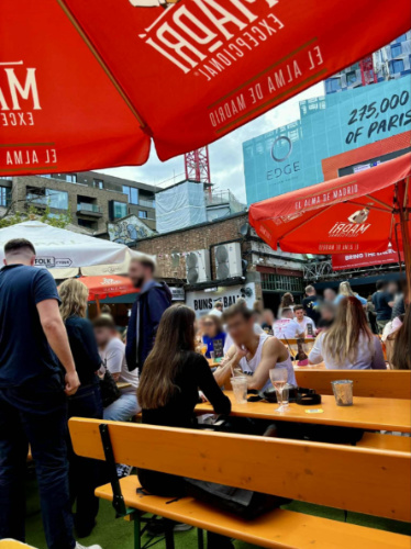 Crowd drinking at the Vinegar Yard beer garden