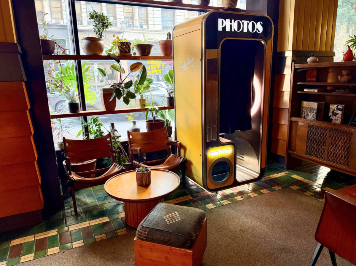 A vintage photo booth in the lobby of Freehand