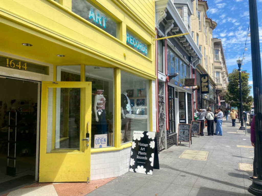 View of the bright yellow exterior of a vintage store in Haight Street
