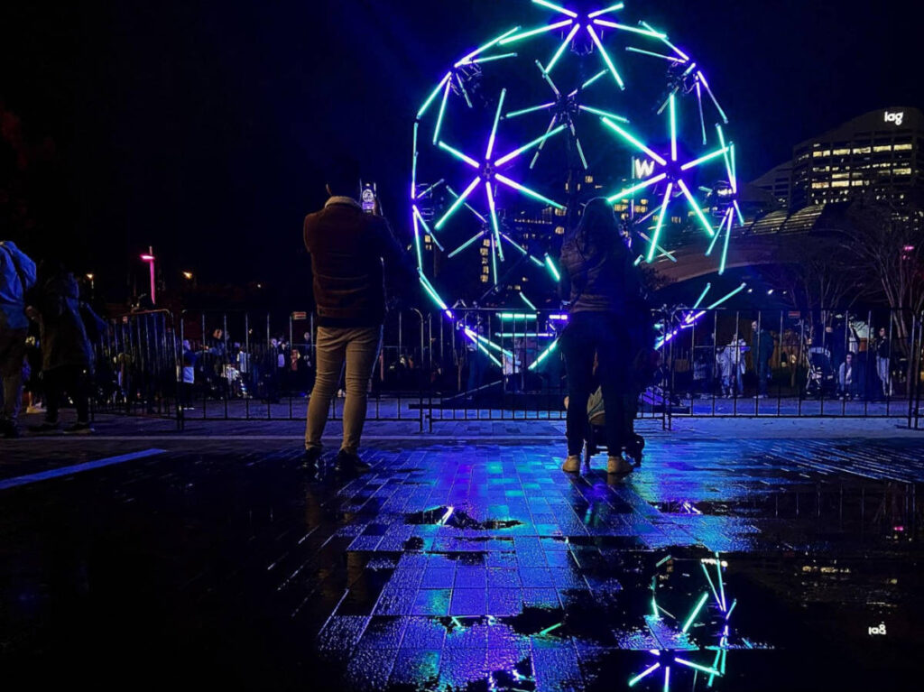 People enjoying the light show installations at the Vivid Festival