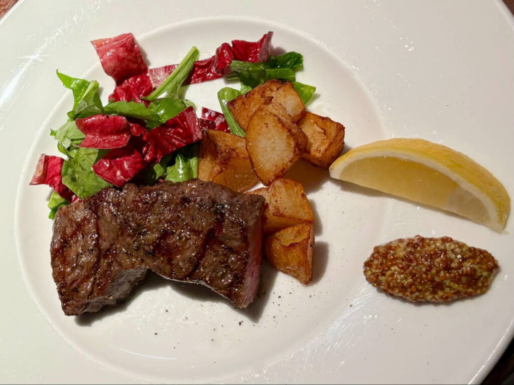 A wagyu beef with vegetables on a plate