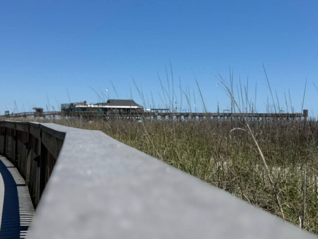 Closeup look of the hand railing of the boardwalk