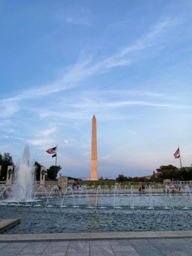 A water fountain and the Washington Monument on the background in Washington DC