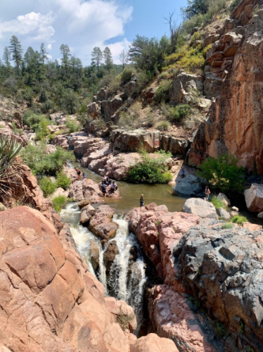 Overlooking view of people at the Water Wheel Falls