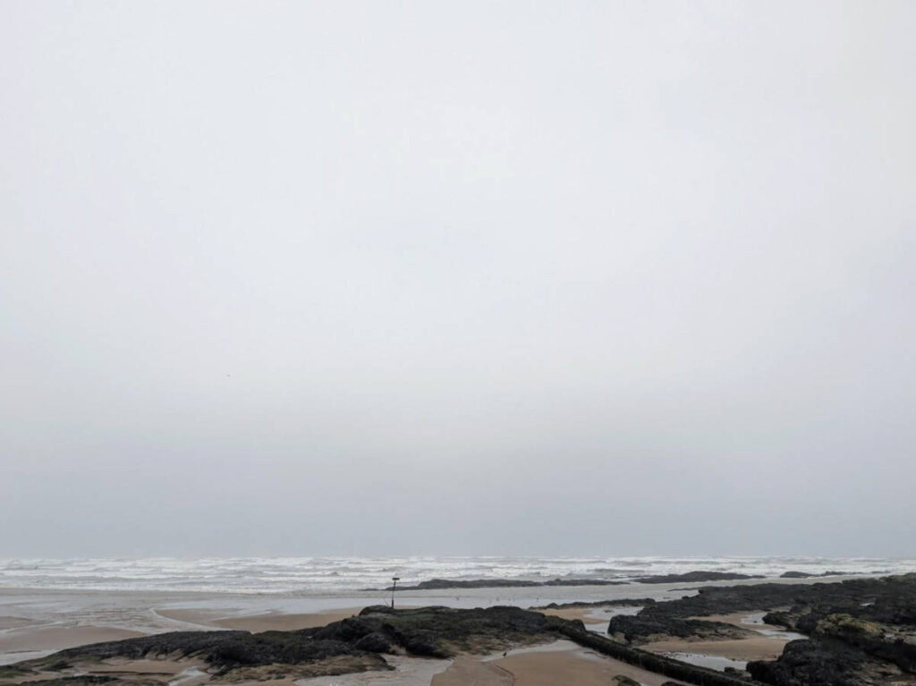 View at the West Sands Beach during a stormy day